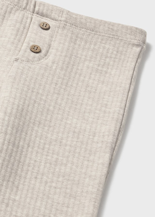 LEGGINGS FLARE COLOR NEUTRO CON BOTTONCINI